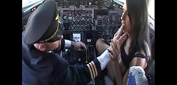  Gorgeous brunette Lisa Sparkle with big knockers begs aircraft pilot to poke her juicy butt